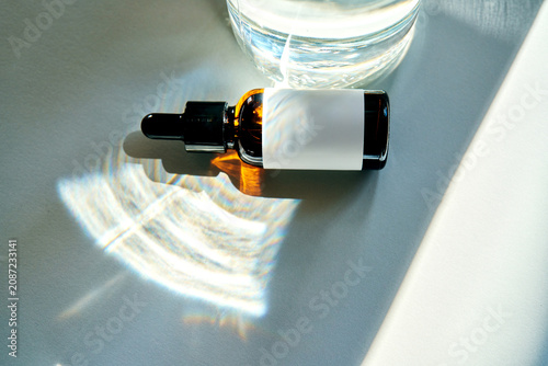 Exosome inspired serum dropper bottle on table