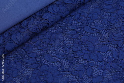 Fotografie Royal blue stretchy lace fabric featuring an elegant, intricate floral pattern
