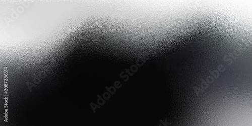 Fotografie Shiny silver foil metallic texture - glossy gray steel gleaming surface, frosted glass effect with blur glare reflection, bright polished metal material