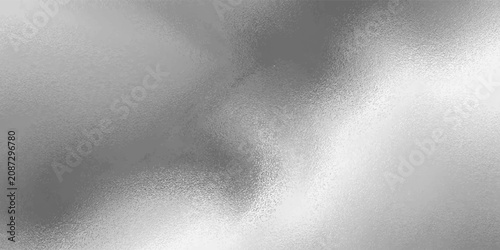 Fotografie Shiny silver foil metallic texture - glossy gray steel gleaming surface, frosted glass effect with blur glare reflection, bright polished metal material