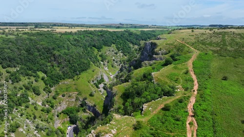 Tracking aerial shot revealing Cheddar Gorge, Somerset, UK