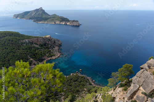 Scenic panoramic view of a rocky island surrounded by deep blue Mediterranean waters