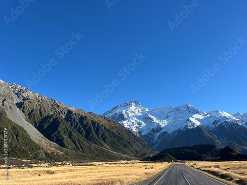 Canvastavla Scenic road leading to snowcapped mountains in Aoraki/Mount Cook National Park,
