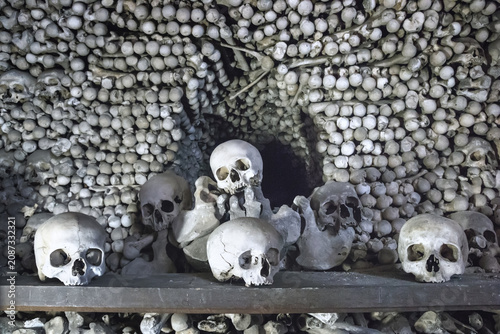 Kostnice Church in Kutna Hora with Ossuary interior decoration from human bones and skulls, Czech republic, in black-and-white color