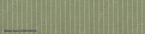 Sage green linen textile surface accented with delicate white vertical pinstripes.