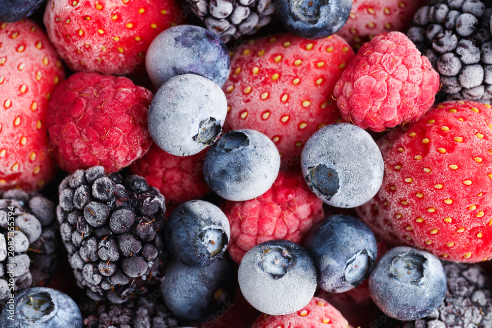 Obraz premium Mix of frozen berries as background, closeup