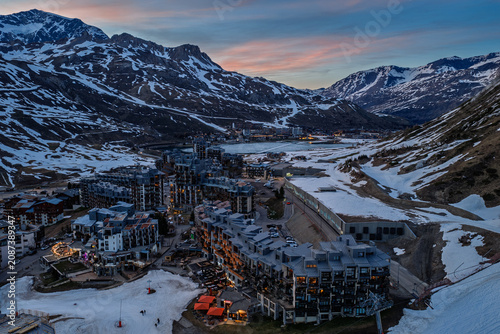 Tableau sur toile Evening drone view of Tignes 2100 in the French Alps, showing illuminated mounta