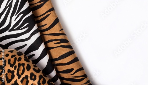texture of print fabric striped zebra and leopard for background isolated on white background copy space for text