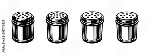 Fotografie Set of four vintage-style metal salt and pepper shakers in a row