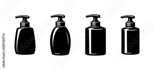 Fotografía Collection of four black pump dispenser bottles in various shapes and sizes