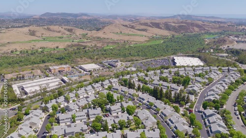 Mission Viejo, California Pullback Aerial of Homes, Traffic and Rolling Hills 01
