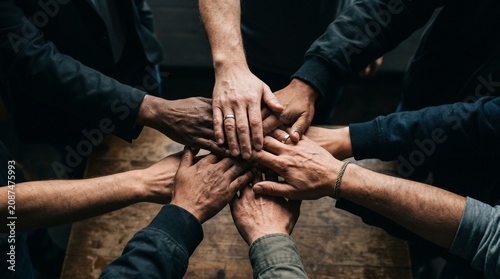 Multiethnic Team Stacking Hands Together for Unity