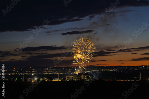 Fireworks over the Rio Grande Valley for the 250th birthday of the USA near Albuquerque New Mexico at sunset