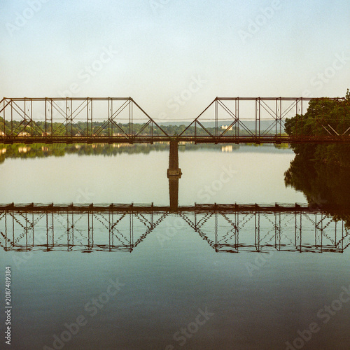 Bridge over a calm river captured on medium format film