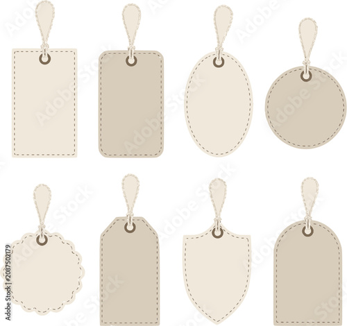 Set of cream color blank gift tags with string and stitched borders