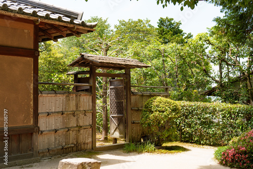 japanese garden with a wooden gate