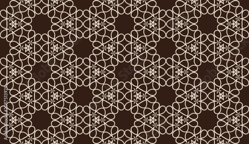Foto A brown and white patterned fabric