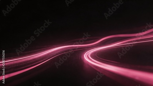 Abstract pink light trails on dark background