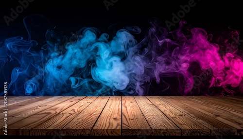 abstract colorful smoke clouds in blue and pink, swirling mist effect over a wooden surface, dark background, vibrant nebula