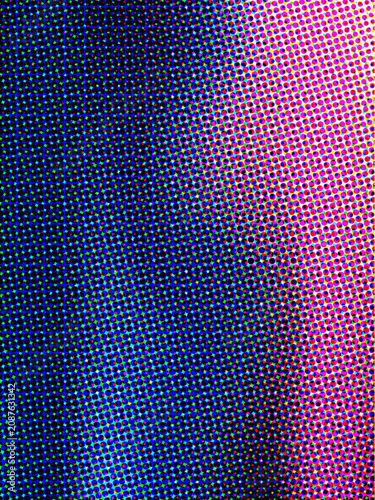 Gradient halftone pattern with vibrant blue and magenta dots, abstract background