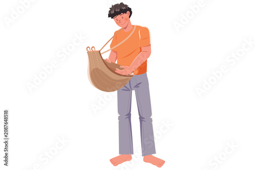 Man carrying woven basket during rural harvest agricultural labor