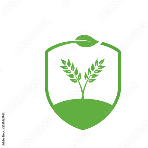 Green shield with wheat and leaf logo