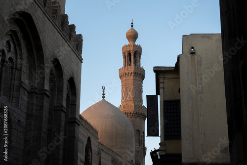Cairo, Egypt - February 11, 2026: The Intricate Stone Façade and Minaret of the Historic Sultan Al-Mansur Qalawun Mo