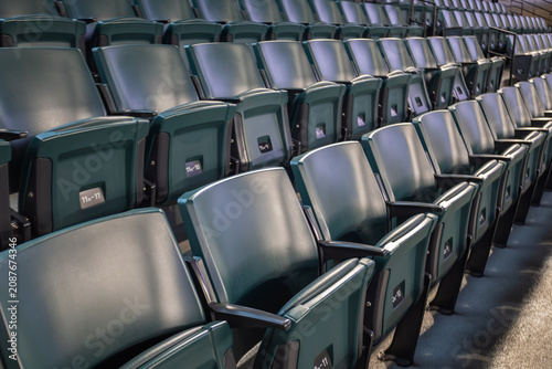 Rows of empty stadium seats before a sporting event
