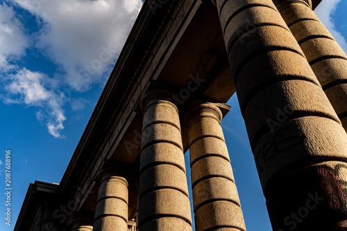 Manhattan Bridge columns with sunset golden hour light.