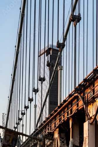 Sunset golden hour of the Manhattan Bridge connecting Brooklyn and Manhattan Chinatown