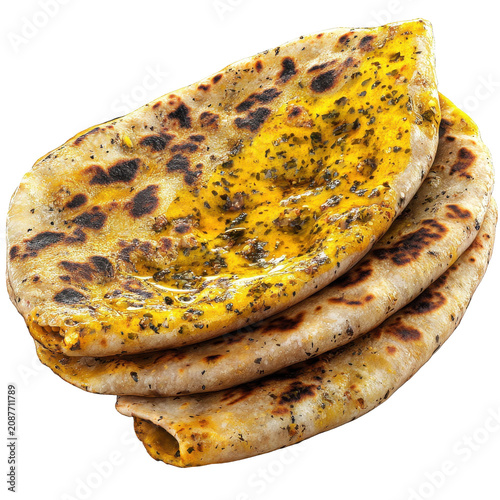 Stack of golden-yellow butter-drizzled indian flatbreads isolated on white background