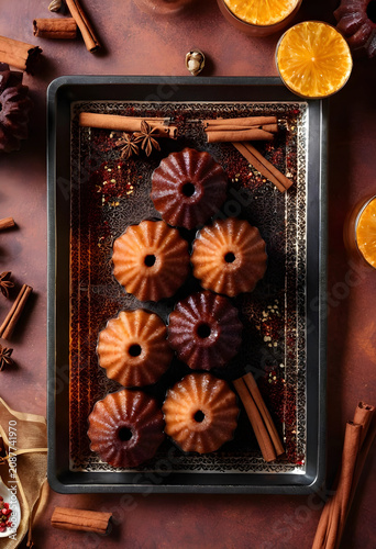 Six canele pastries with ci...