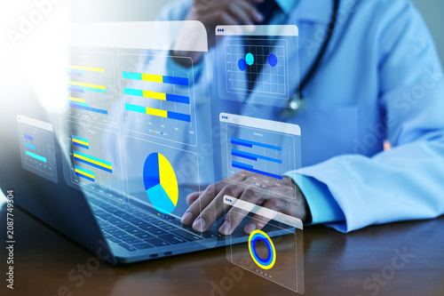 Doctor using AI-powered health data dashboard to monitor patient analytics, medical statistics, and clinical decision support in real time.
