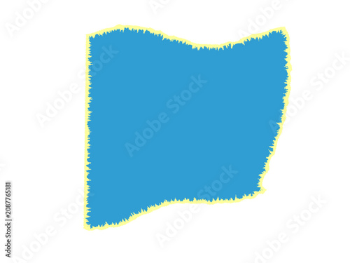 Photos A blue fabric square patch with a frayed yellow edge on a flat surface