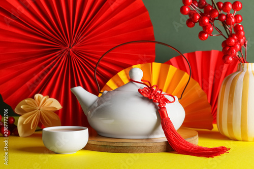 Composition with teapot, cu...