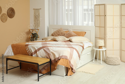 Comfortable bed, bench and ...