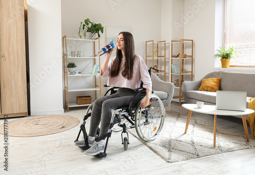 Sporty young woman in wheel...