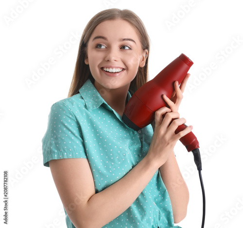 Female hairdresser with dry...