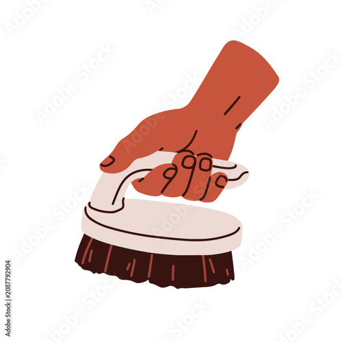 Hand holding scrub brush with bristles and handle grip. Cleaning tool, access...