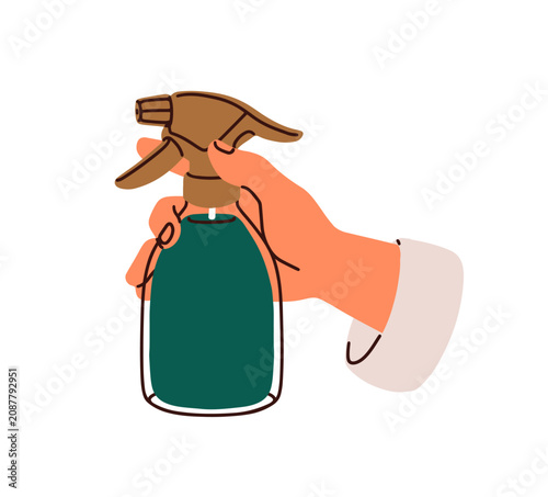Hand holding spray bottle with trigger nozzle. Cleaning sprayer. Household cl...