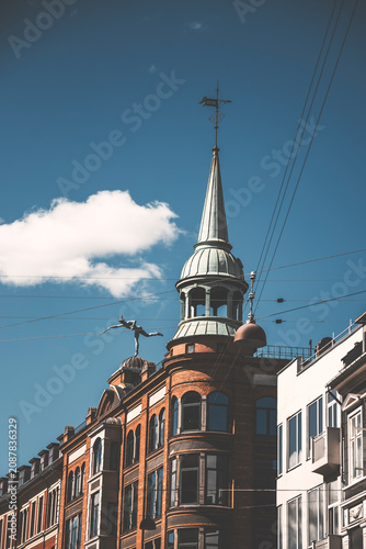 detail of the tower and statue of copenhagen messen