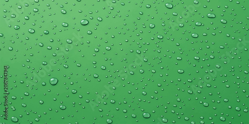 Obraz na plátně Dewdrops on Green Surface: A vibrant green surface is adorned with numerous small, clear dewdrops, creating a refreshing and natural texture