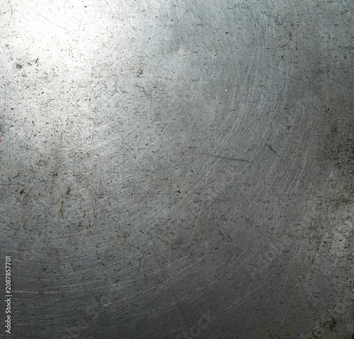 Fotografie Scratched Metallic Aluminum Surface Texture with Light Reflection, Grungy Brushe
