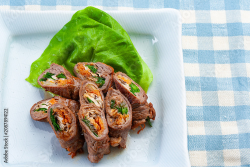 Japanese beef vegetable rolls: Savory sliced beef wrapped around carrots, celery, and shiitake.
