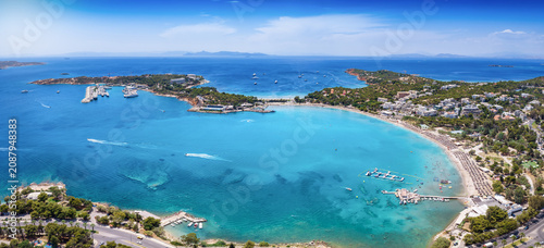 Panoramic aerial summer day view of the bay and beach of Vouliagmeni, south Athens coast, Attica, Greece