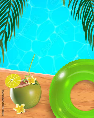 Clear blue water ripples gently beneath palm fronds. Coconut drink with slice and flower garnish sits on wooden deck. Bright green inflatable ring rests nearby, inviting relaxation. Copy space