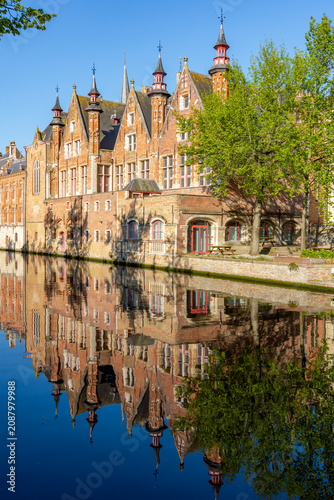 Architecture of old Bruges facing Groenerei (Green) canal, Belgium