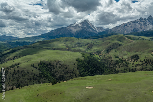 Aerial View of Mount Genyen: Alpine Meadow, Coniferous Forest and Canyon in Garze