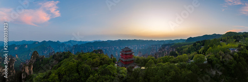 Aerial View of Traditional Chinese wooden pagoda at the top Tianzi Mountain in Zhangjiajie at Dusk, Hunan Province, China