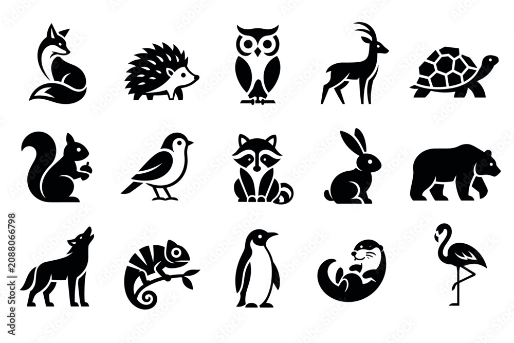 Fototapeta premium Black animal icons featuring fox hedgehog owl deer turtle squirrel bird raccoon rabbit bear wolf chameleon penguin otter and flamingo